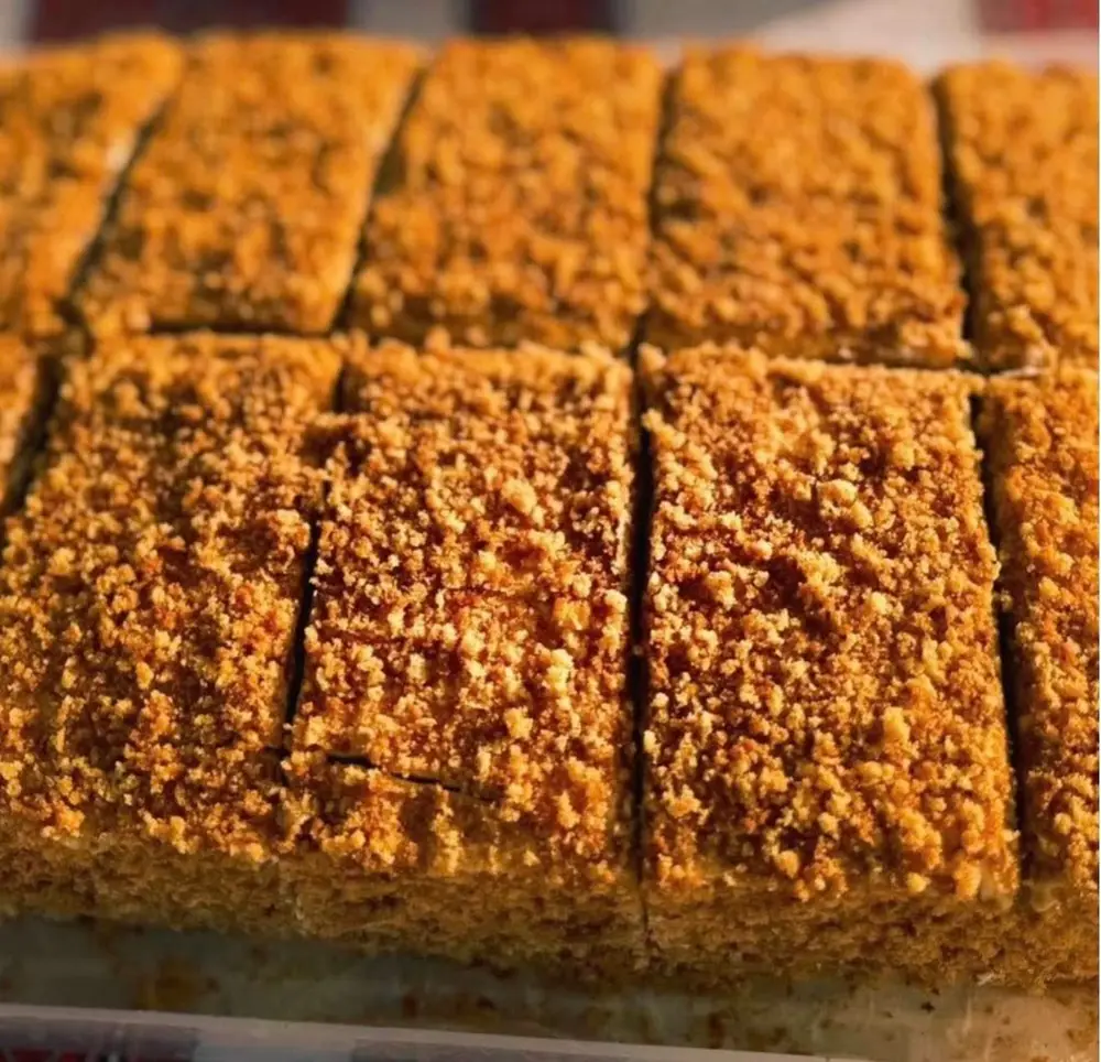 Slices of Medovik honey cake seen from above showing the crumb top